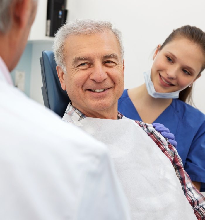 Man talking to dentist