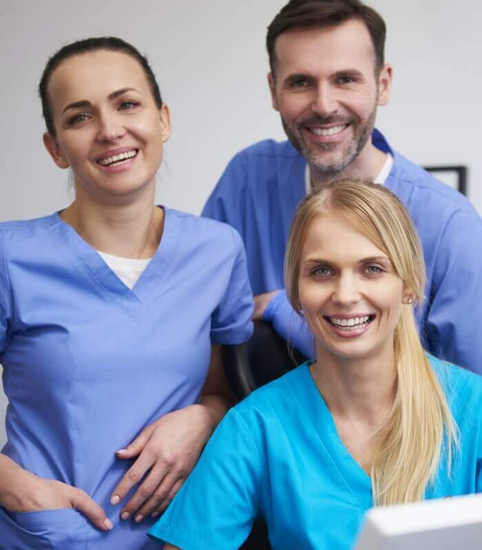 Three dental team members