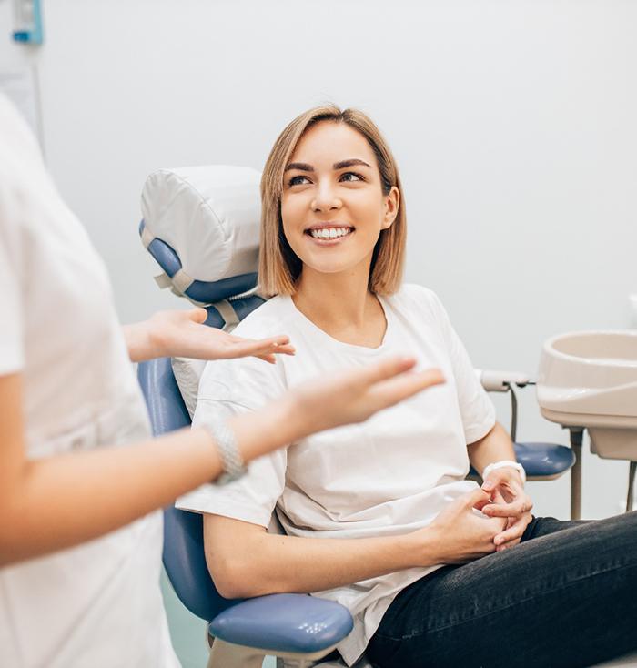 patient talking to dentist