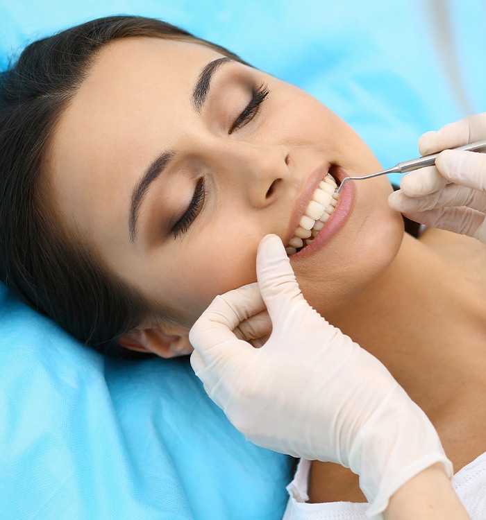 Patient receiving dental treatment