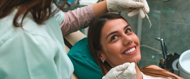 Woman receiving dental exam