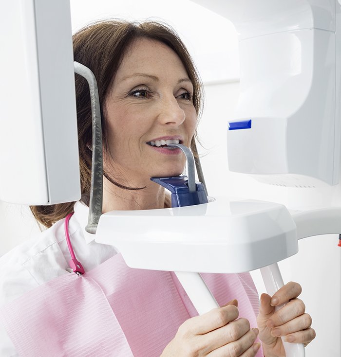 Woman receiving 3 D C T cone beam scan