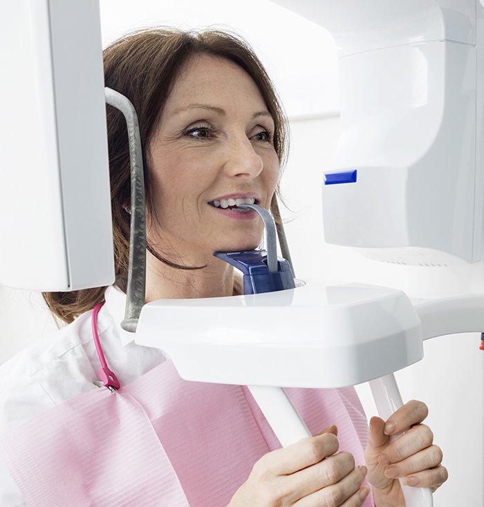 Woman receiving dental scan