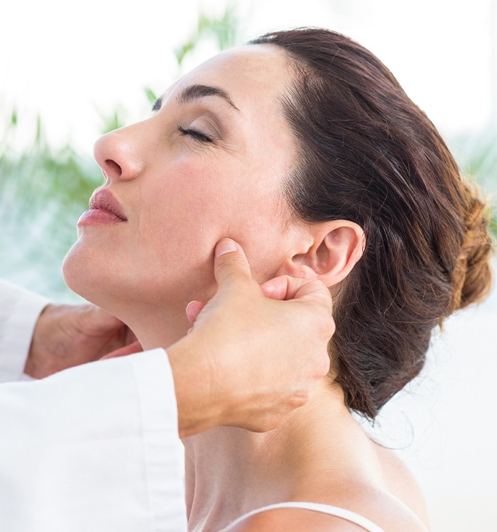 Woman receiving dental treatment